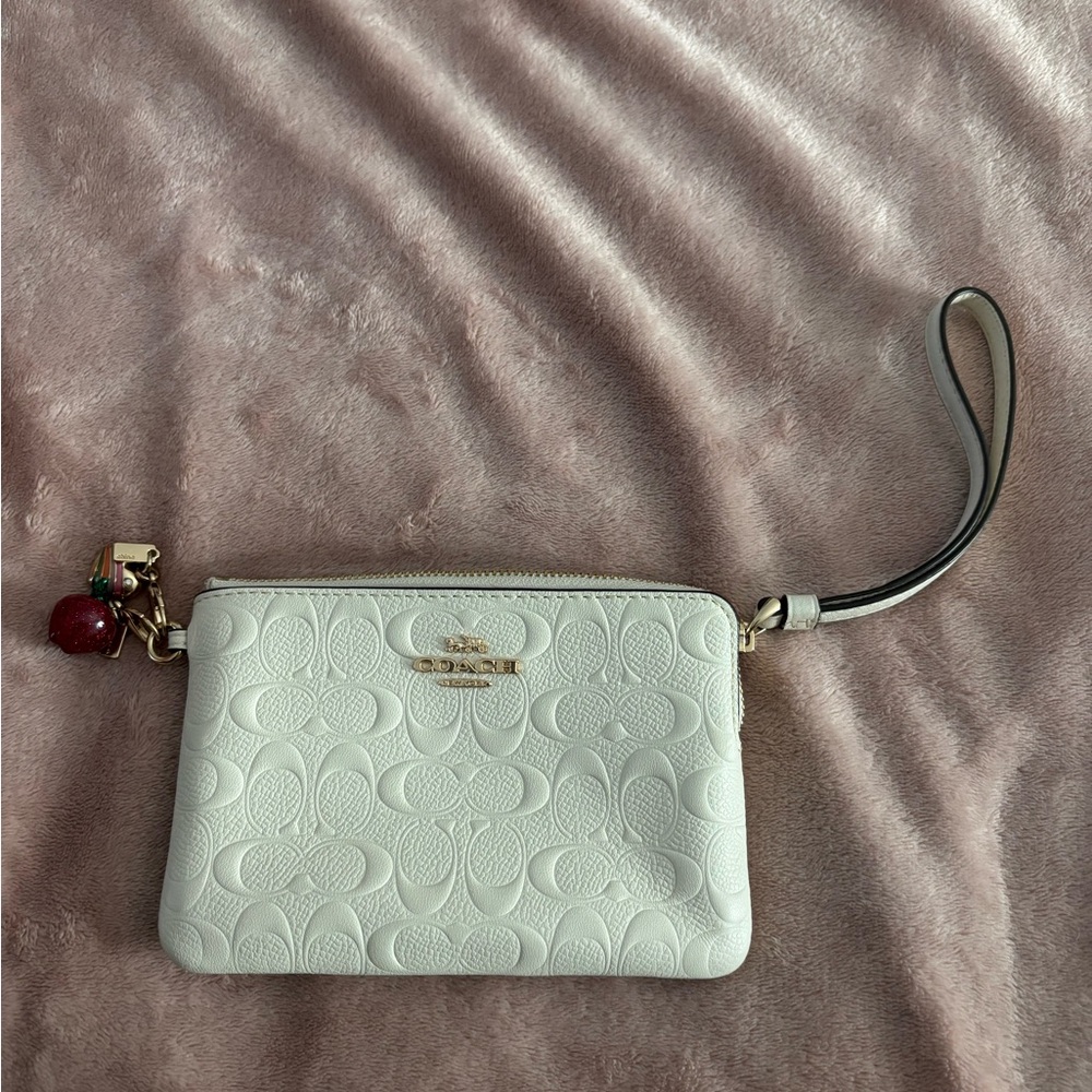 ❌sold❌Coach wristlet with charms